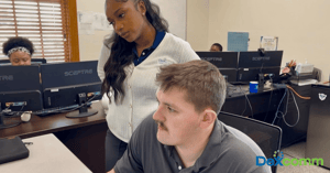 Dexcomm agents answering calls during a call surge