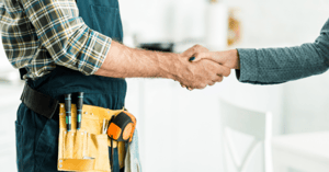 service worker and customer shake hands