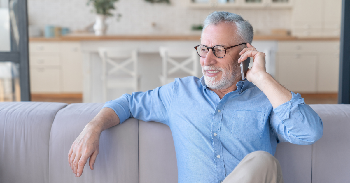 Man on the phone at home