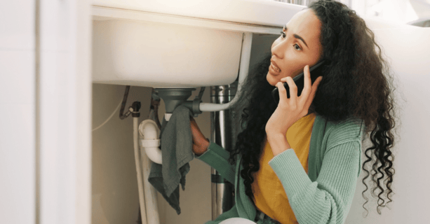 Lady on the phone worried about sink plumbing