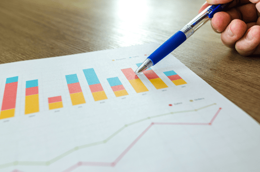 pointing at diagram with pen